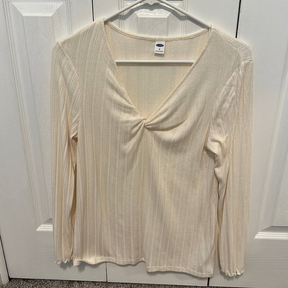 Cream long sleeve v neck.